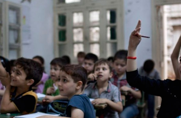 Los niños vuelven a la escuela en Alepo