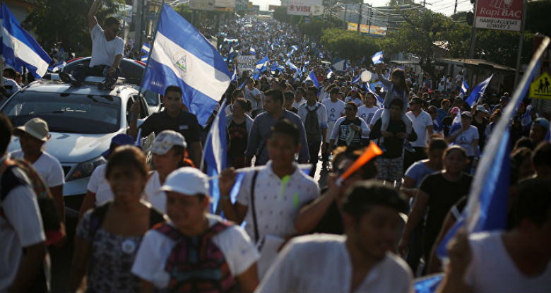 Oficialistas en Nicaragua marchan a favor del diálogo