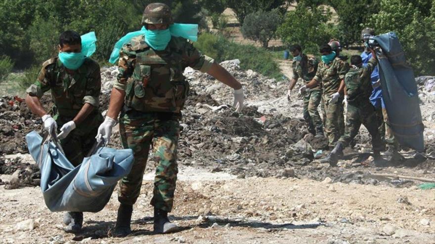 Encuentran fosa común con soldados sirios ejecutados