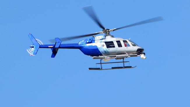 Chinos ofrecen viajes en helicóptero para promover el turismo en invierno
