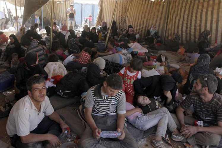 Refugiados sirios en El Líbano claman por ayuda al ser azotados por tormenta