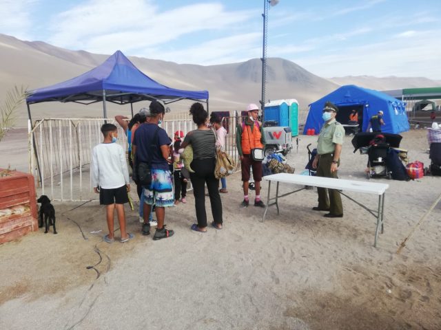 INDH y redes de apoyo humanitario visitaron refugio de migrantes en playa Lobito de Iquique