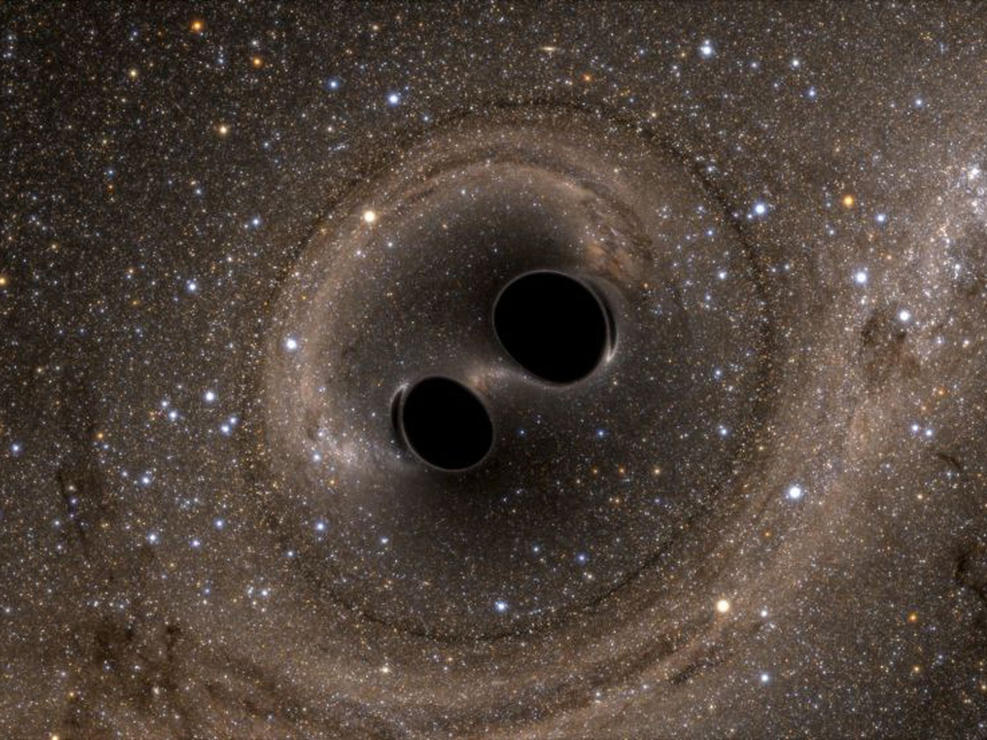 Hallan dos agujeros negros destinados a colisionar